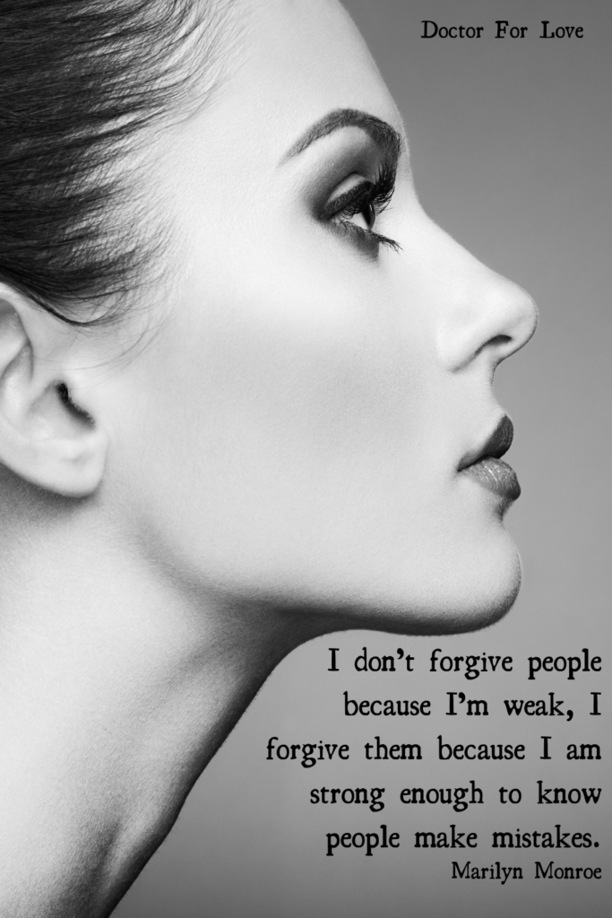 profile of a woman's face and a quote by Marilyn Monroe on the bottom right corner of the photo