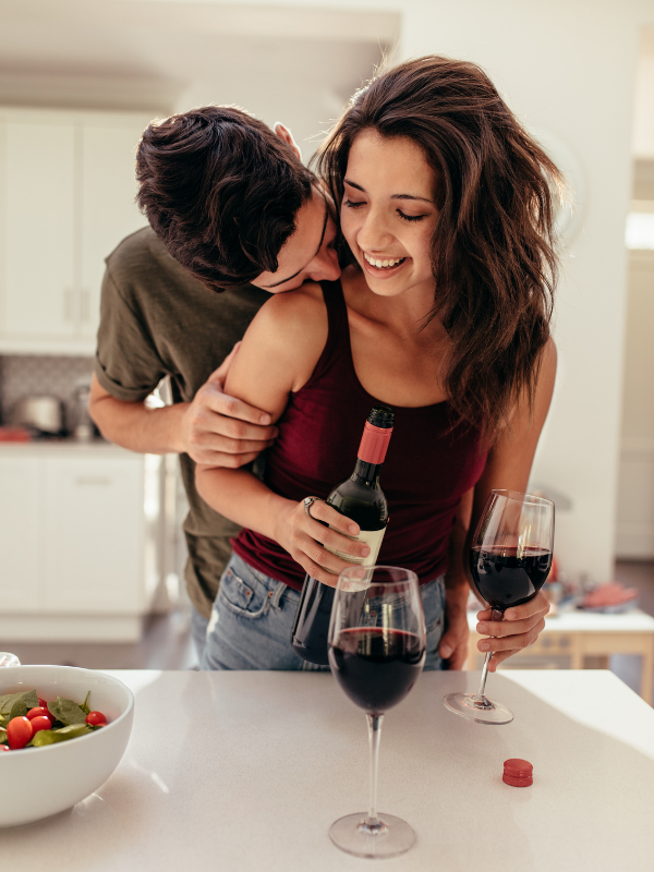 man-kissing-a-woman-on-her-neck