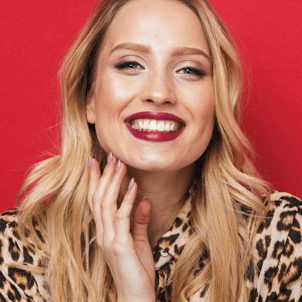 beautiful-woman-smiling-wearing-red-lipstick