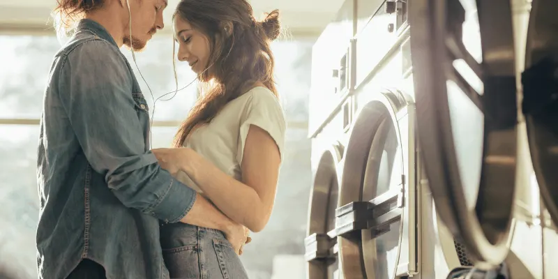 couple-hugging-in-laundry-room