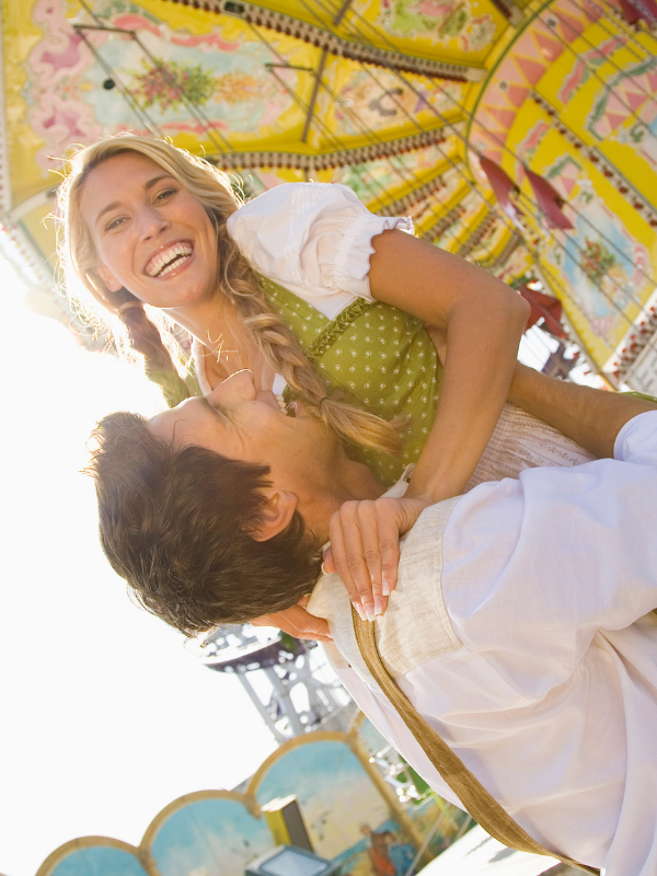 happy-couple-wearing-bavarian-clothes