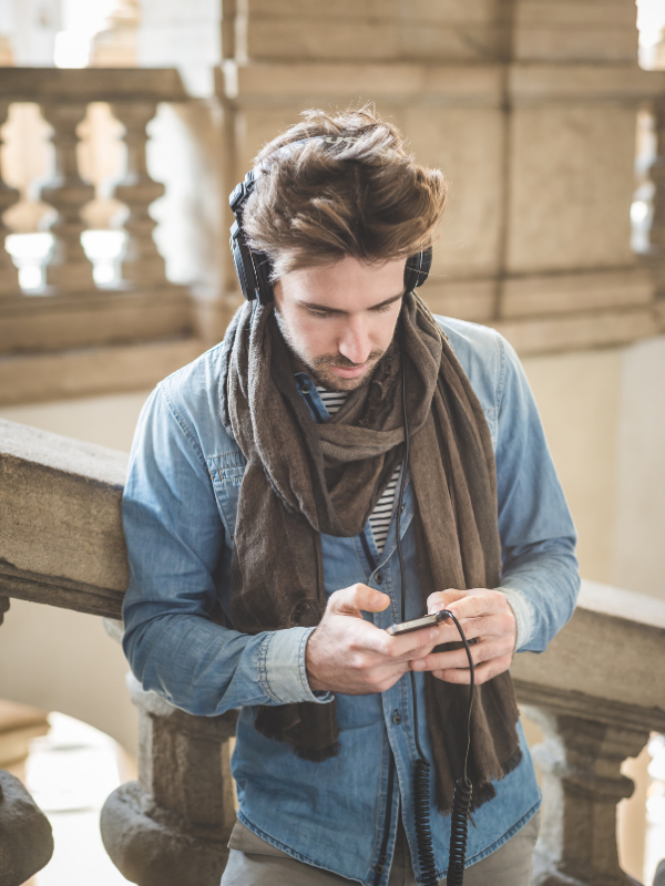 man-listening-to-music-on-his-phone