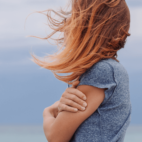 woman-alone-next-to-the-windy-sea