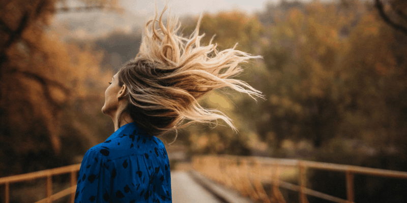 woman-with-her-hair-in-the-wind