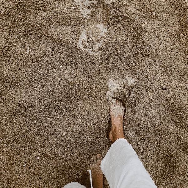 woman-walking-in-the-sand