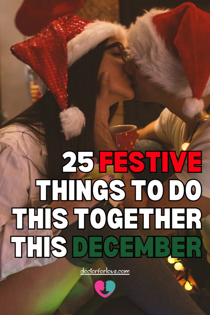couple with Santa's hats are kissing