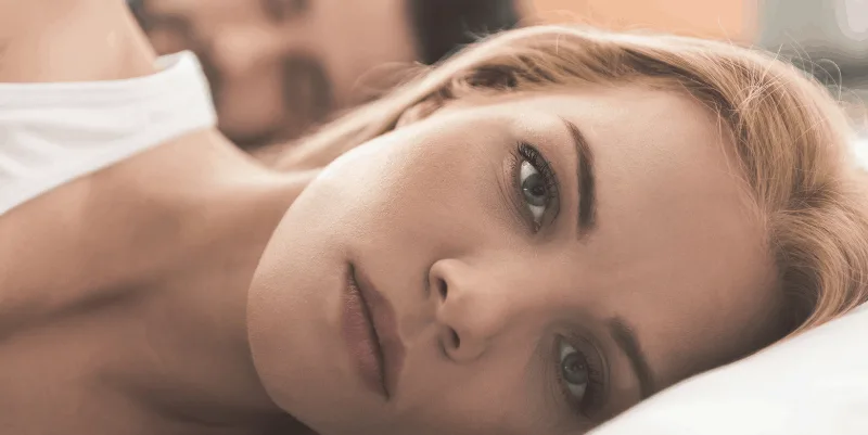 sad-woman-in-bed
