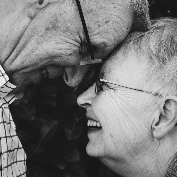 old couple smiling at each other