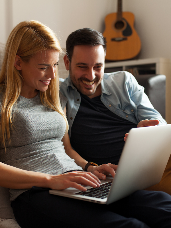 couple looking at laptop