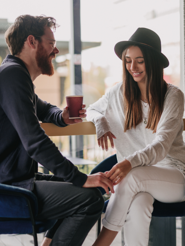 couple on a date in the coffee place