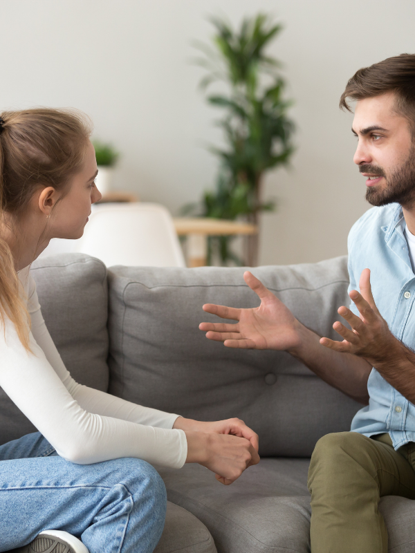 man talking to woman
