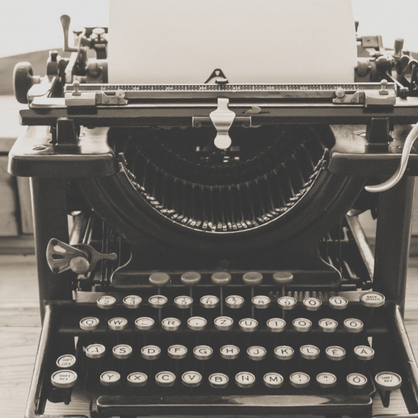 old typewriter featured photo for post on love quotes by hemingway