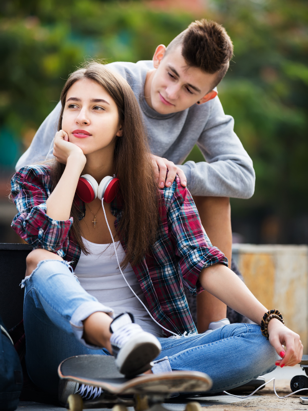young woman ignoring her boyfriend