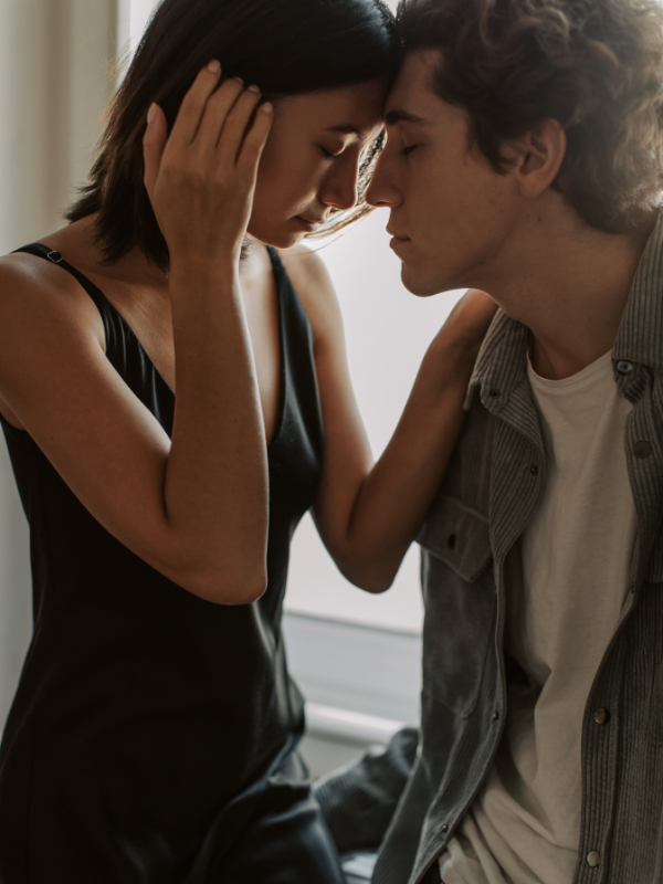 man and woman face to face in love